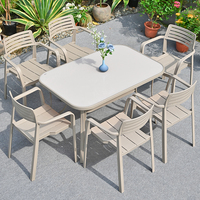 Table à manger d'extérieur moderne et durable en bois avec cadre en aluminium, imperméable et résistante aux UV, pour la plage, la cour et le balcon