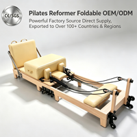 Reformer de Pilates pliable haut de gamme avec structure en bois de chêne, machine de Pilates professionnelle pour les distributeurs et les studios haut de gamme