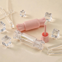 Tubes de brillant à lèvres roses au design mignon en forme de bonbon avec poignée en forme de cœur, tubes de brillant à lèvres en plastique vides, emballage portable pour huile à lèvres