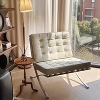 Fauteuil Barcelona : Fauteuil lounge individuel pour salon, design minimaliste en cuir ou en tissu, avec accoudoirs en métal