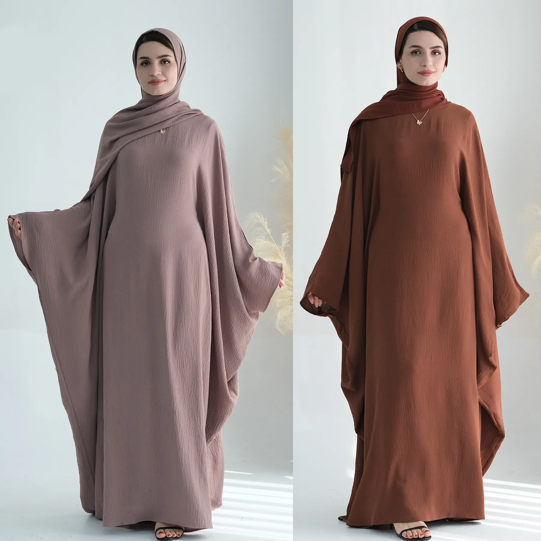 Loriya baru gaun Muslim Kaftan Abaya kerut poliester ukuran besar gaun wanita sederhana pakaian Islami wanita Abaya