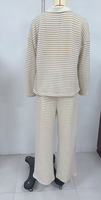 Ensemble 2 pièces tricoté pour femme, style rétro occidental, à rayures, avec haut à col polo à manches longues et pantalon large, collection automne-hiver, vente en gros, décontracté 2026