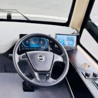 DAOD Nouveau Jeepney Électrique LHD 26 Places Sièges Longs en Banc Face à Face Mini Bus 250km Bus Urbain Transport Public