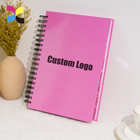 Carnet personnalisable format A4, couverture rigide, reliure spirale, logo estampé or, impression offset, pages en papier d'art, agenda quotidien