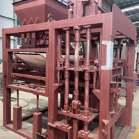 Machine automatique de fabrication de blocs de béton QT4-15E, haute efficacité, ligne de production de blocs et de briques Siemens PLC pour usage industriel