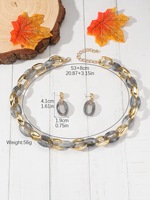Nouvel ensemble collier et boucles d'oreilles tendance transfrontalier, long, en acrylique, avec chaîne en plastique et perles multicolores, au design épuré et audacieux, polyvalent