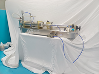Machine de remplissage horizontale semi-automatique pneumatique en acier inoxydable durable pour liquides et pâtes cosmétiques