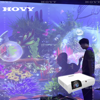 Projecteur interactif immersif pour salle à manger, projecteur mural, de sol et de table LCD avec laser et lentille laser intégrée pour restaurant