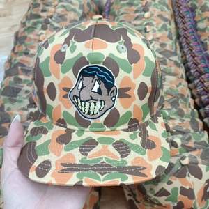 หมวกแก๊ปทรง 6 แผง ปีกโค้งเล็กน้อย ลายพราง ปักโลโก้ 3 มิติ แบบพอง สปอร์ต ปรับขนาดได้ แฟชั่นสำหรับปั่นจักรยาน - Product Image 1