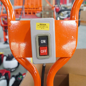 Vibrateur à béton électrique orange avec interrupteur marche/arrêt pour machines de construction - Product Image 1