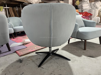 Fauteuil pivotant capitonné de style mid-century moderne, chaise en velours rembourrée avec base en métal noir