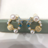 SHDIYAYUN Vente en gros Boucles d'oreilles à clous en forme d'étoile de mer en plaqué or 18 carats avec perle d'eau douce Accessoire de bijoux