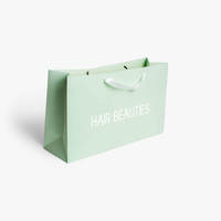 Design personnalisé emballage de vêtements de luxe 250 g/m² sac en papier d'art pour vêtements