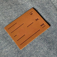 Étiquettes en cuir PU écologiques personnalisées, imprimées et gaufrées, avec couleur et forme personnalisées