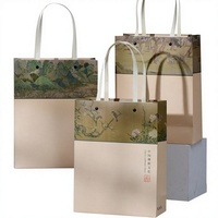 Sac cadeau haut de gamme personnalisé de style chinois avec impression de logo pour le thé et la pâtisserie, accepte les commandes personnalisées