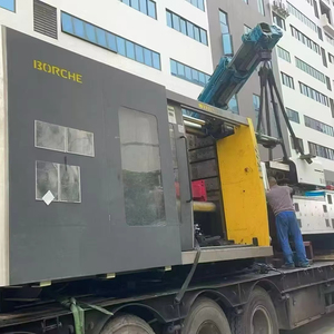 Machine de moulage par injection horizontale hydraulique à deux plats de 1000 tonnes, 5ème génération, contrôlée par PLC, avec boîte de vitesses et vis de roulement, d'occasion, modèle Borch - Product Image 2