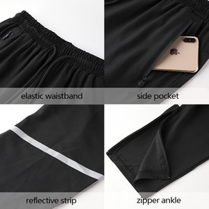 Venta al por mayor personalizado en blanco <span class=keywords><strong>pantalones</strong></span> de chándal de poliéster de los hombres <span class=keywords><strong>Slim</strong></span> <span class=keywords><strong>Fit</strong></span> cremallera pie <span class=keywords><strong>para</strong></span> <span class=keywords><strong>hombre</strong></span> Jogger <span class=keywords><strong>pantalones</strong></span> con rayas reflectantes - Product Image 5