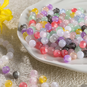 Cuentas perforadas de resina de colores variables ópticamente, cuentas sueltas redondas de 10 y 12 mm para hacer joyería DIY, pulseras, collares y manualidades. - Product Image 1