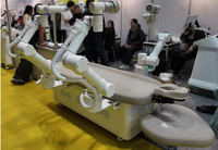 Yeni Üç Kollu 19 Eklemli Yapay Zeka Akıllı Masaj Robotu Müzikli Zamanlayıcılı Kontrol Cihazı Tak ve Çalıştır Güç Kaynağı Dahili Yatak Tipi Tam Vücut Güzellik Salonları ve Spa'lar için