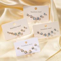 Pendientes de tuerca de acero inoxidable con circonitas engastadas en forma de garra, juego de pendientes pequeños, juego de tres piezas de pendientes de tuerca redondos con circonitas.