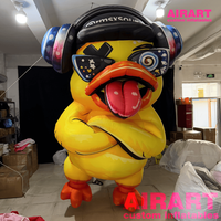 Modèle de canard jaune gonflable géant personnalisé avec casque et lunettes de soleil pour décoration d'événements et d'expositions en centre commercial