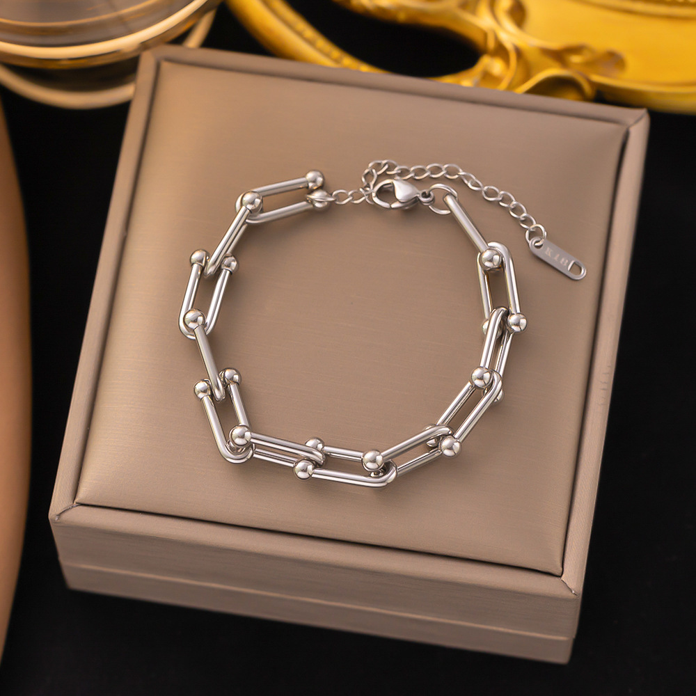 bracelet en forme de U couleur acier