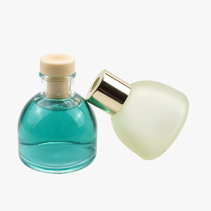 Bouteille vide transparente en verre pour aromathérapie 40ml 50ml avec bouchon rond et ouverture lisse, ne blesse pas les mains, vente en gros personnalisée - Product Image 1