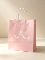 Sac en papier rose à motifs floraux et de papeterie, idéal pour les cadeaux et les faveurs de mariage