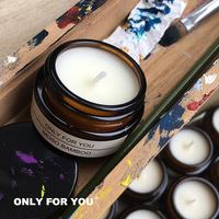 Vente en gros de bougie parfumée à la cire de soja en cire de noix de coco dans un pot à bougie en verre ambré avec couvercle Bougies parfumées de luxe de marque privée