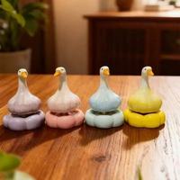 Vente en gros de toupies de bureau multi-styles en céramique, modèles miniatures en forme de poire, canard et pingouin