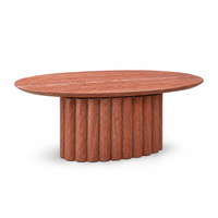 Table à manger ovale en travertin rouge avec piétement cannelé, meuble en pierre naturelle