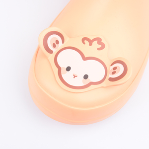 Bottes de pluie en caoutchouc pour enfants orange avec un motif représentant des petits singes et des bananes - Product Image 6