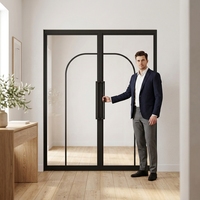 Porte battante moderne en acier à double vitrage avec ouverture latérale et surface finie pour la décoration d'appartements et de maisons