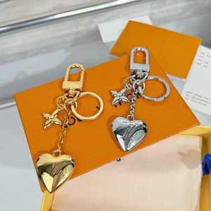 Llavero de metal con dijes de esmalte coloridos, colgante de corazón dorado para llaves de coche, accesorios para bolso de mujer - Product Image 5