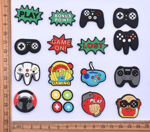 Venta al por mayor de dibujos animados de PVC de plástico suave parche DIY accesorios de la caja del teléfono celular con música y estilos religiosos zapatos de muñeca plana y dijes - Product Image 3