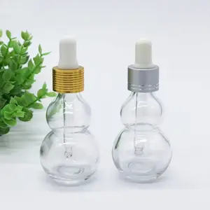Factory price amber transparent flat Double gourd bottle 30ml Essential oil Medicated wine Adjustable oil Glass dropper bottle