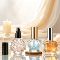 Vente en gros de flacons de parfum miniatures de luxe de 3 ml, 5 ml, 10 ml, flacon vaporisateur, flacon de parfum en forme de coquillage, flacon de parfum en forme de pomme, bouchon noir doré