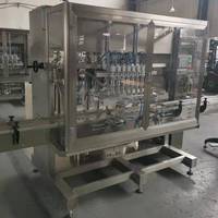 Machine de remplissage d'huile moteur automatique électrique de haute précision contrôlée par PLC