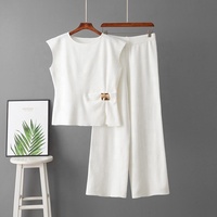 Nouvel ensemble d'été chic : haut tricoté sans manches et pantalon large, ensemble deux pièces tendance pour femme, idéal pour le quotidien, en cachemire.