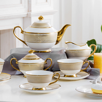 Tasse à thé en céramique européenne personnalisée avec bord doré pour desserts, gâteaux, collations, fruits secs, apéritifs, théière pour mariage, fête, hôtel, vente en gros
