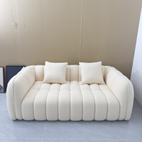 Canapé modulaire moderne à accoudoirs arrondis, capitonné style Channel, en tissu bouclé, compressé et emballé sous vide, pour salon