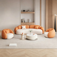 Canapé d'angle compact moderne et courbé orange pour salons, zones de réception, salons de beauté, magasins de vêtements, en suède anti-griffures