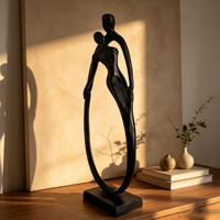 Sculptures abstraites de couple en fonte faite à la main, figurines d'amoureux noires, décoration moderne et écologique pour la maison, statue d'art de luxe pour le bureau