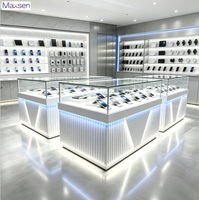 Table de présentation de téléphone portable Maxsen, en verre, avec éclairage LED ambiant, affichage numérique gris et blanc, robuste et écologique, pour usage commercial