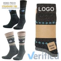 Chaussettes d'hiver en laine tricotées OEM, chaudes et confortables, avec revers, anti-humidité, épaisses, pour le sport et la randonnée, anti-bactériennes, logo personnalisable