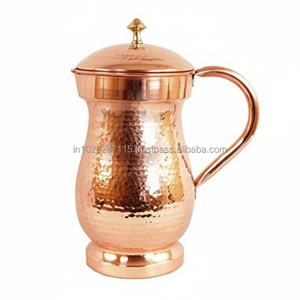 เหยือกทองแดงหรูหราที่มีพื้นผิวเรียบและรูปทรงสง่างามทำขึ้นเพื่อการตกแต่งหรือใช้งานได้จริง - Product Image 1