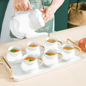 Set da tè in ceramica bollitore moderno per uso domestico tazza da acqua bollitore con vassoio tè pomeridiano set da tè in oro dipinto a mano