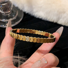 Bracelet écailles de poisson doré