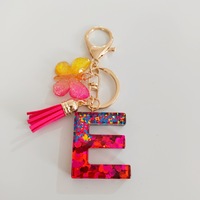 Porte-clés en résine scintillante colorée KC370 avec fleur et pompon, breloque de sac