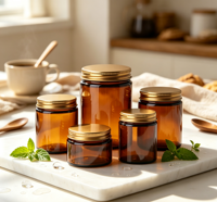 Vente en gros de pots cosmétiques en verre ambré avec couvercle en métal doré, contenants en verre vides pour bougies et crèmes, plusieurs tailles